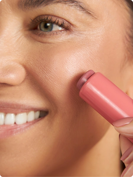 Blush Crush: Woman applying Silky Tint to cheek