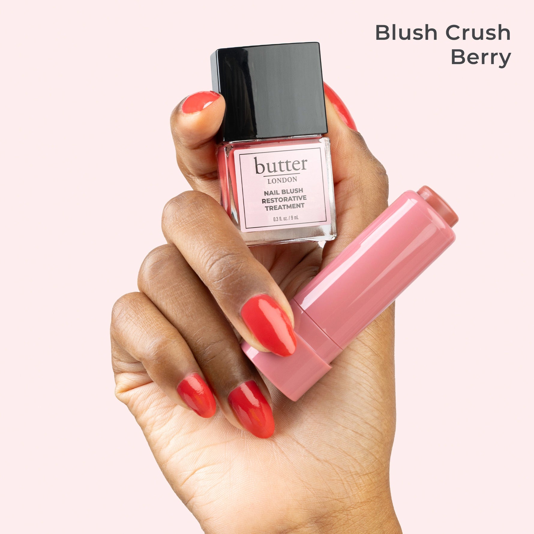 Blush Crush silos in hand against pink background - PÜR x butter LONDON 