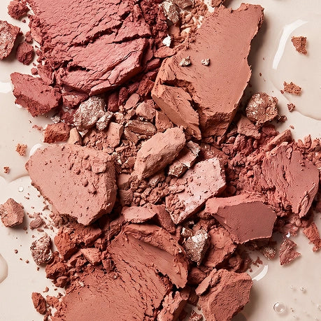 Key Ingredients - Pigment Minerals: Crushed blush on pink background