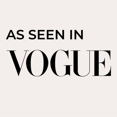 Text 'AS SEEN IN VOGUE' on a beige background