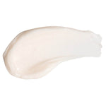 Creamy, lightweight swatch of PÜR Get A Lift Firming Facial Cream showing its silky, smooth texture.